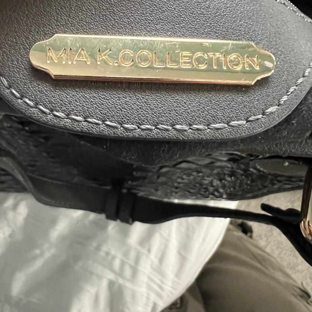 a gently used medium sized Michael kors purse